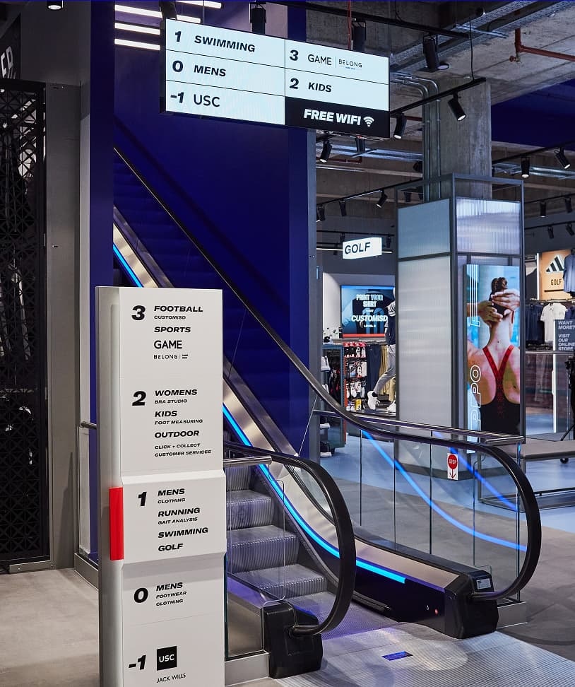 Sports direct escalator wayfinding